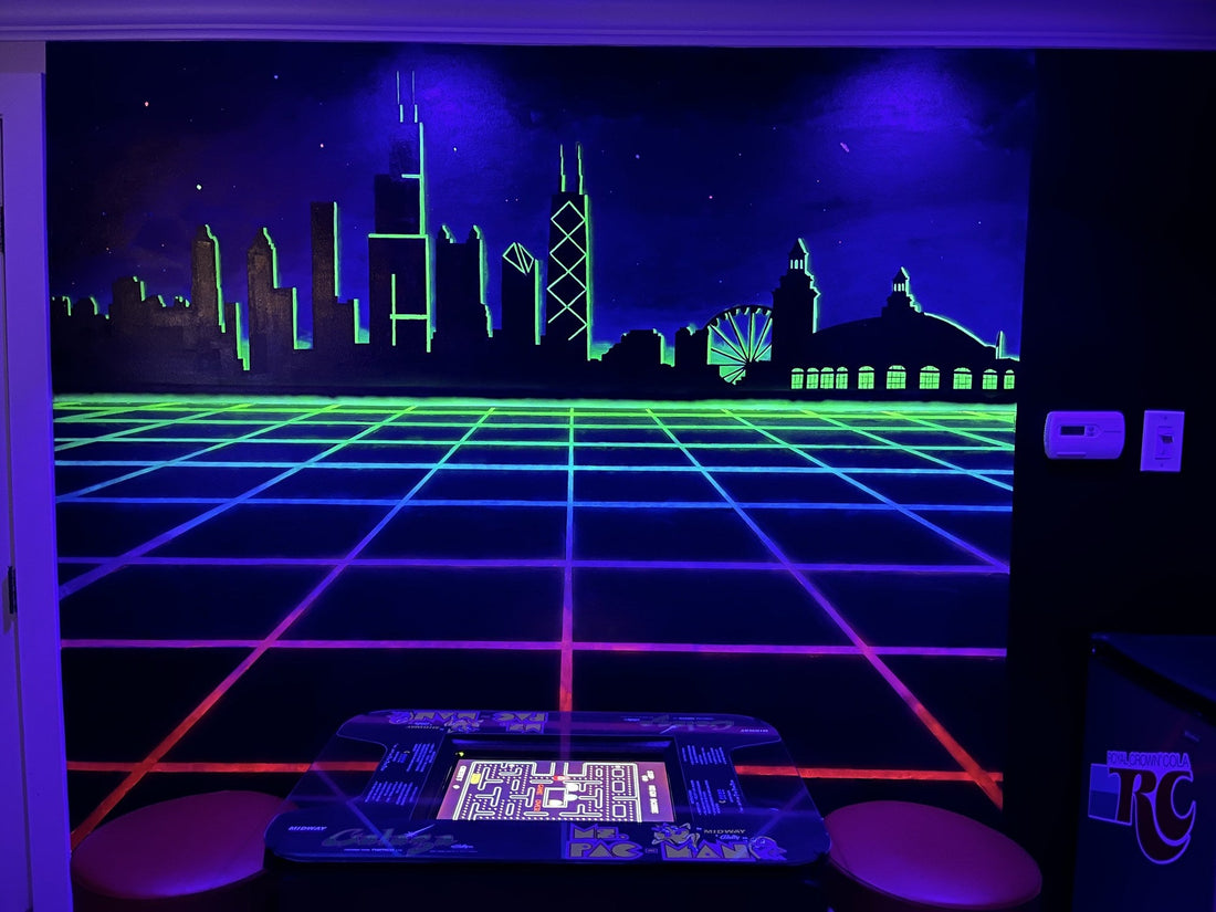Basement wall mural of a neon Chicago skyline on a glowing rainbow perspective grid, in the 1980s outrun aesthetic.
